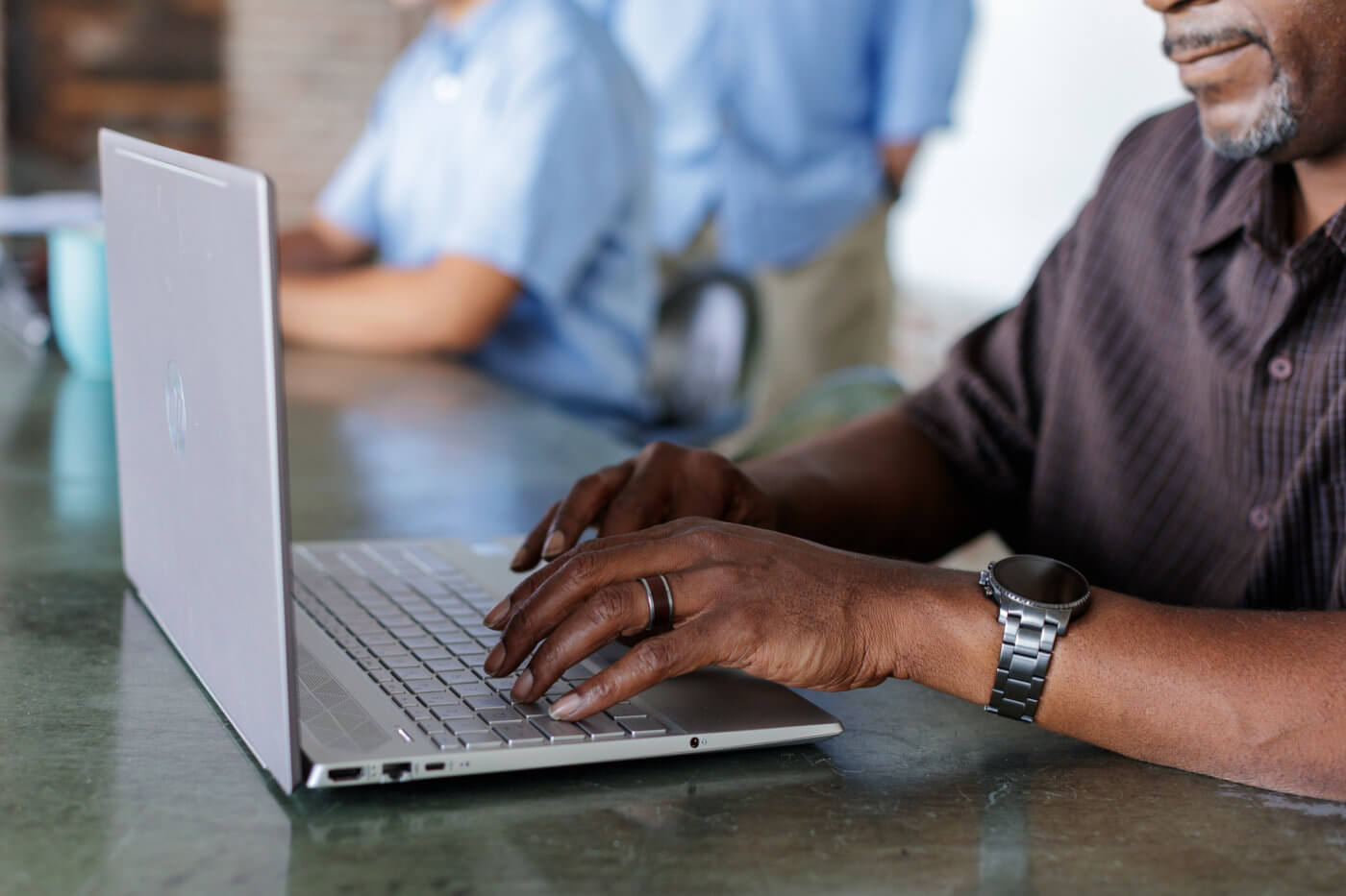 Man Typing on Computer