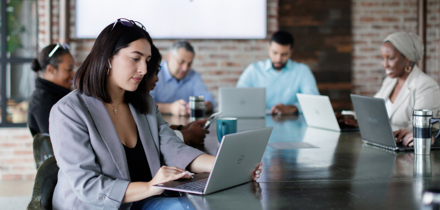 Girl looking at laptop searching for data analytics jobs